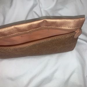 Gold makeup bag